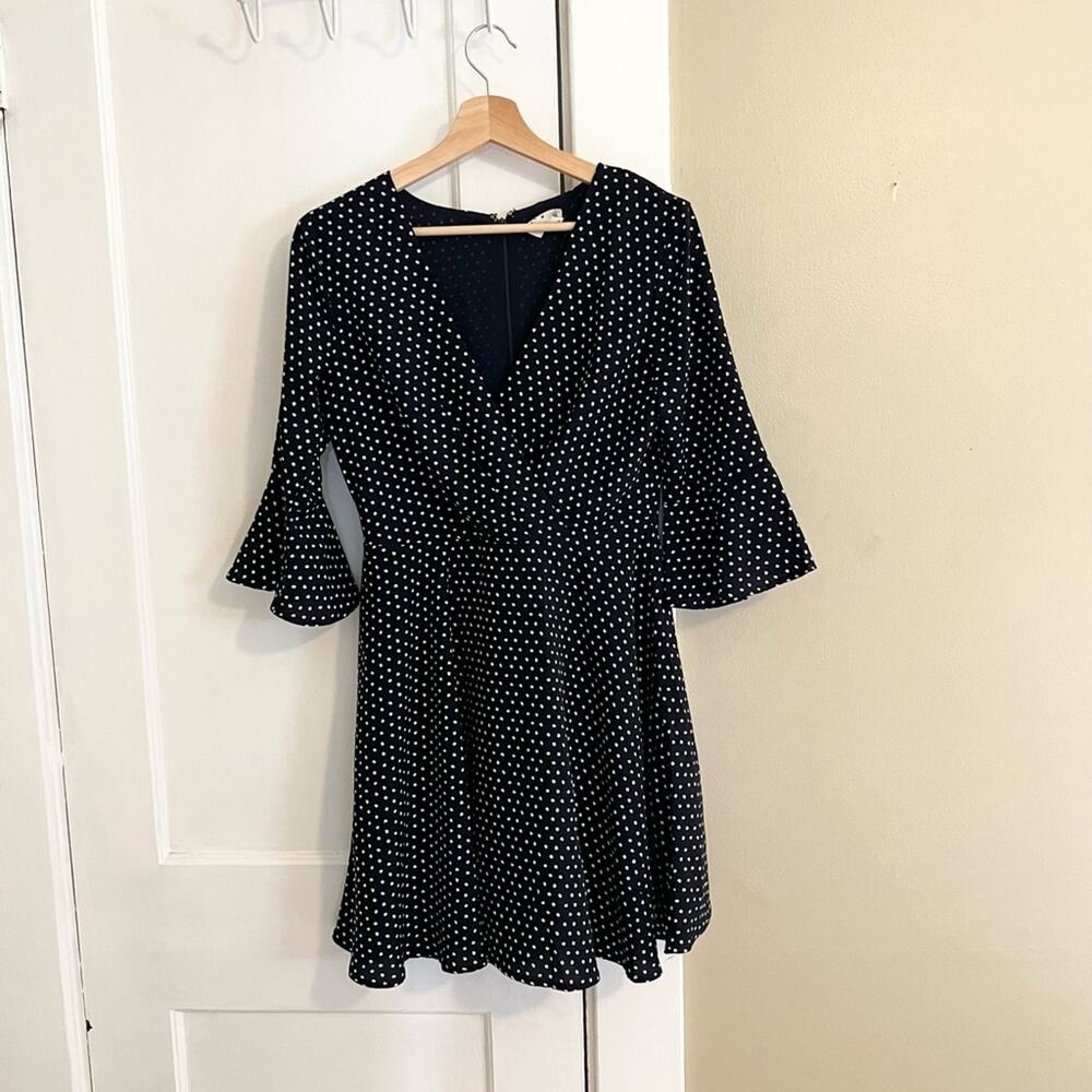 Everly Anthropologie blue and white polka dot dress faux wrap bell sleeve